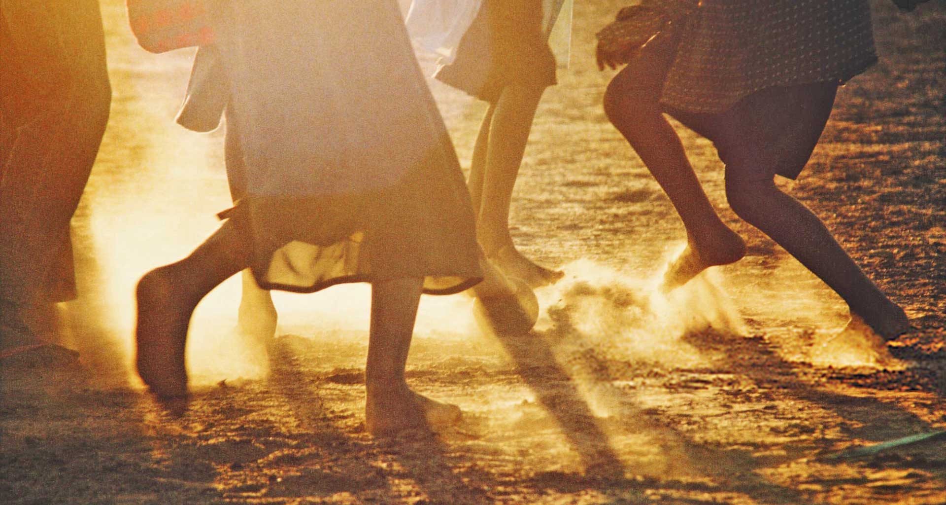 Feet of African Children at Sunset - Importance of Cultural Identity in Building Communities