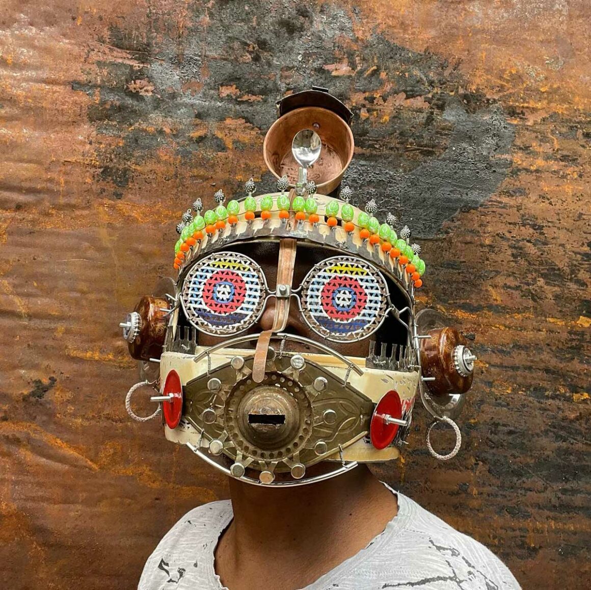 Cyrus Kabiru creatively uses recycled rubbish and old material mostly collected in the streets of Nairobi to explore the theme of transformation and imagination. | Image: Cyrus Kabiru